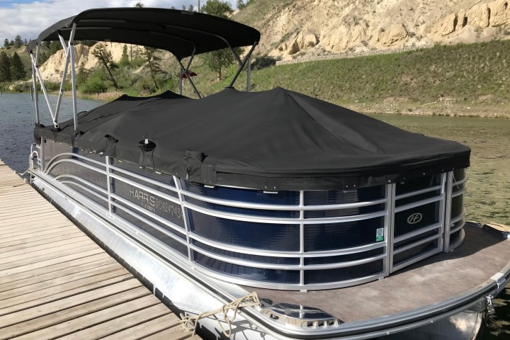 a boat sitting on top of a mountain