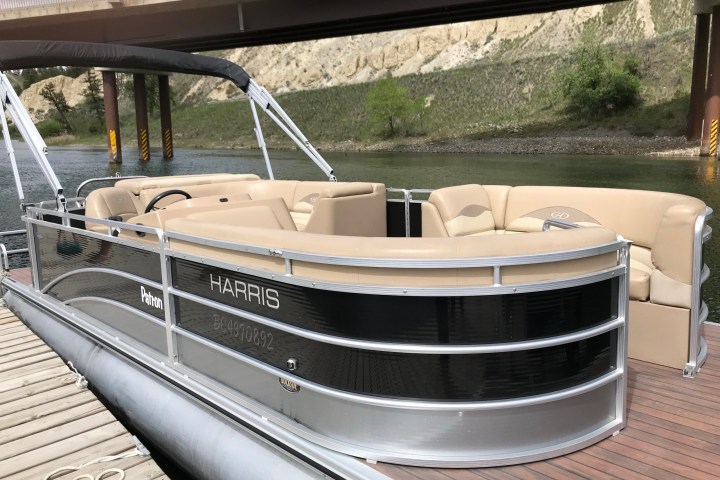 a boat sitting next to a window